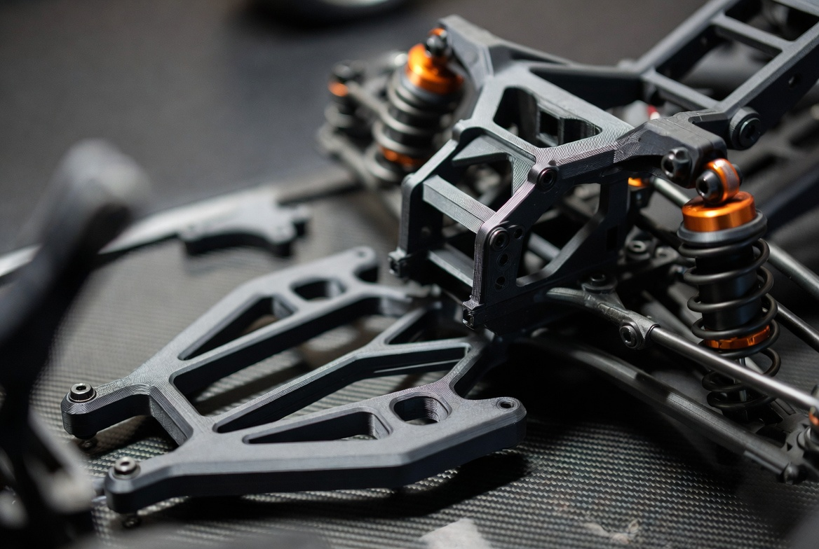 Carbon-fiber nylon suspension arms